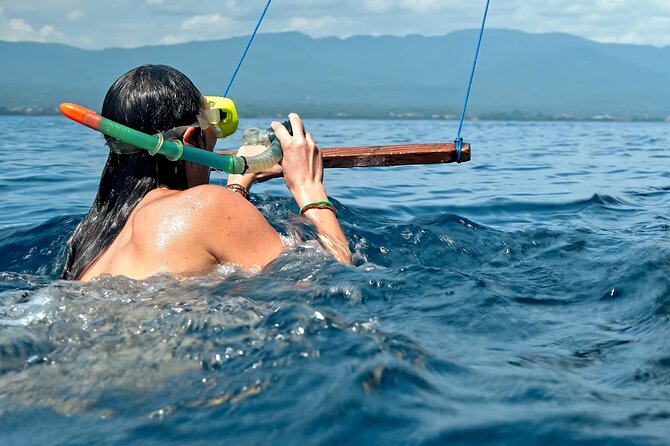 Lovina Dolphin Watching, Swimming, and Snorkeling Experience - The jukung boat and how the dolphin hunt is managed