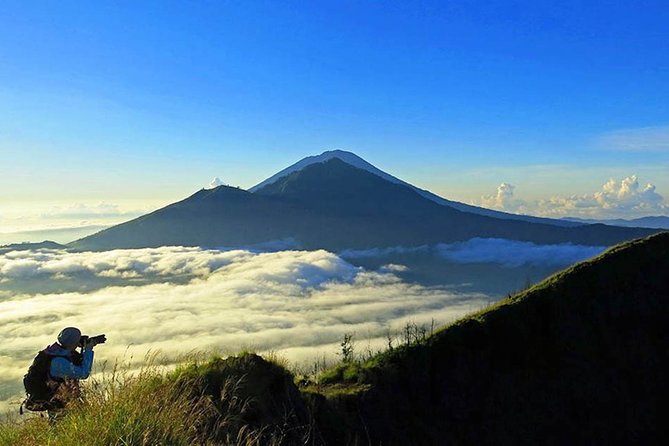 Mount Batur Guide and Natural Hot Spring - The summit experience: sunrise photos plus a complimentary breakfast