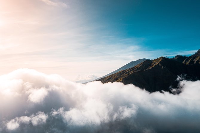 Mount Batur Sunrise Trekking and Rice Terrace Adventure - Sunrise on the crater rim: breakfast, hot drinks, and the wait for light
