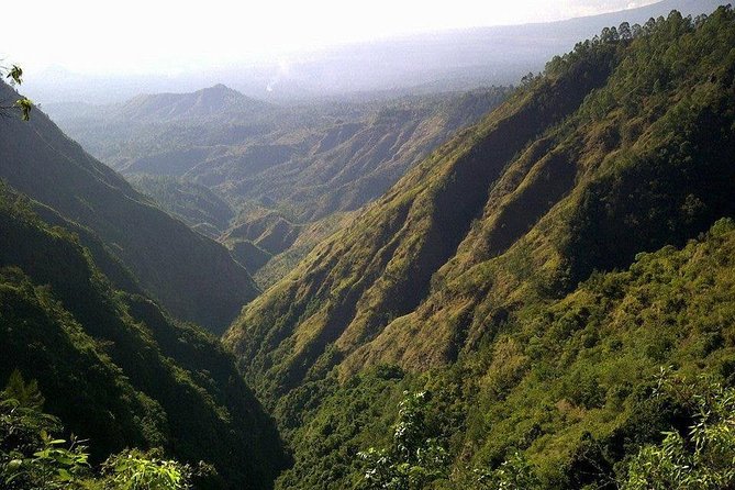 Mount Batur Sunrise Trekking and Rice Terrace Adventure - Coming down in daylight: black sand, lava streams, and Agung in the distance