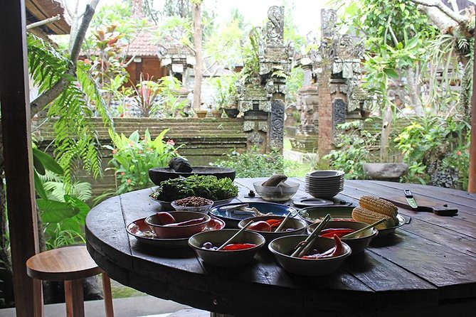 PRIVATE Balinese Cooking Class in Ubud with Dewa with Transfers - Inside the walled family compound: cooking without the factory feeling