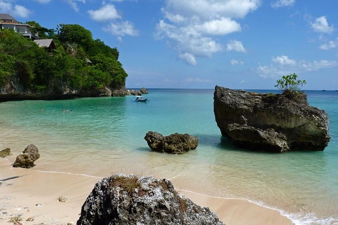 Private Tour Bali Beaches and Uluwatu Temple with Dinner - Uluwatu Temple: cliff views, temple moments, and monkey-smart visits